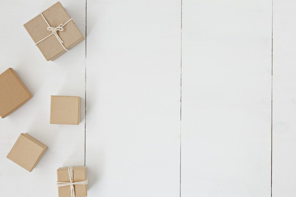 brown gift box on white surface