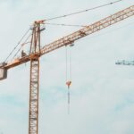 person sitting on tower at daytime